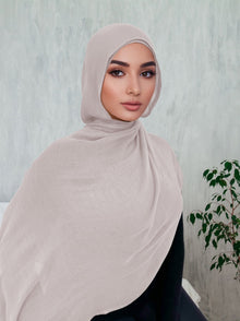 Woman wearing a beige gray premium breathable modal hijab — neutral everyday hijab by Ayesha's Collection