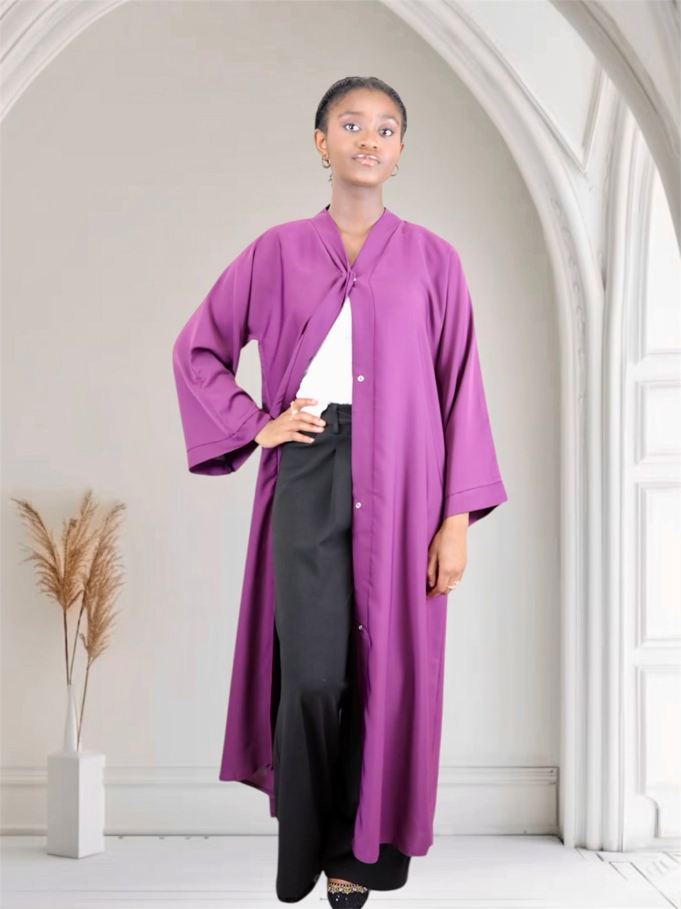 Woman wearing a long purple abaya in USA