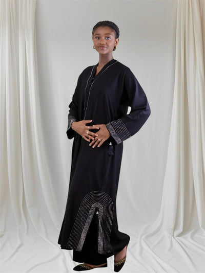 Woman black abaya dress with silver embellishments