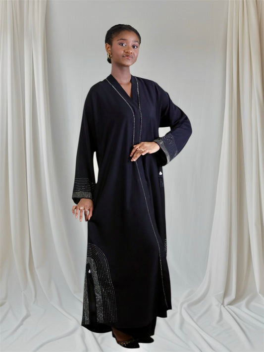 Woman black abaya dress with intricate detailing