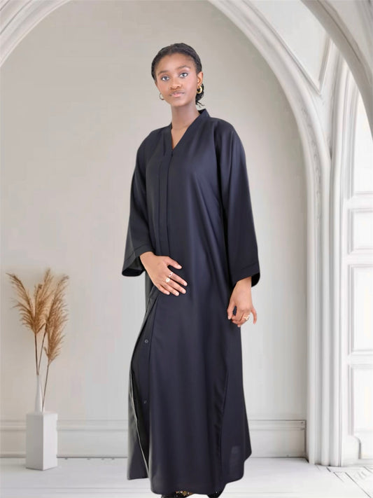 Woman wearing a black abaya from Ayesha's collection USA