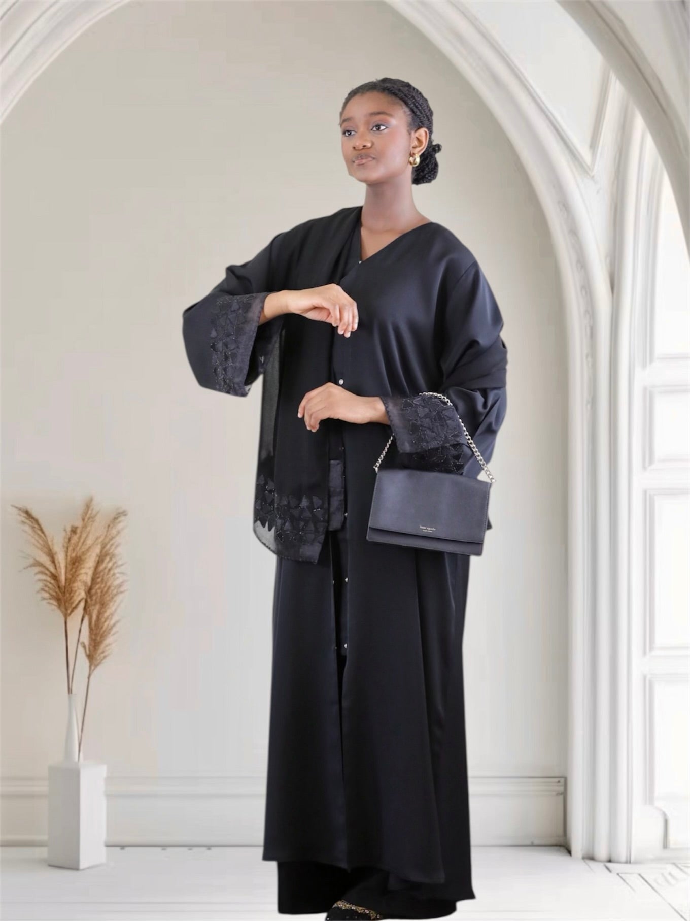 Woman wearing a black luxury embroidered abaya set with matching hijab — Ayesha's Collection USA
