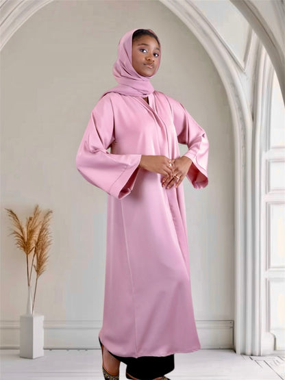 Woman wearing a pink abaya 