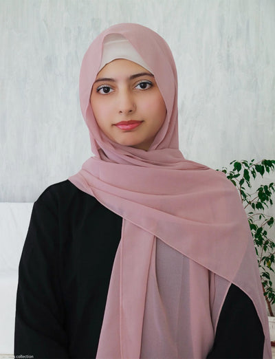 Woman wearing a pink lightweight chiffon hijab — soft everyday modest hijab by Ayesha's Collection USA