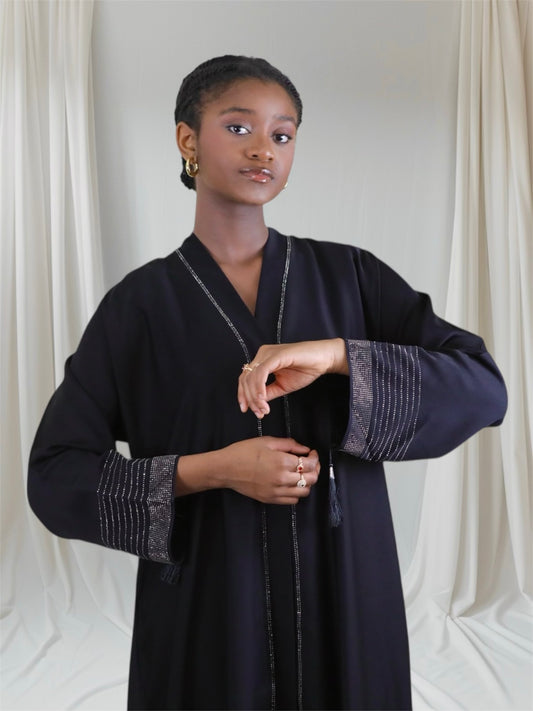 Woman wearing a black outfit